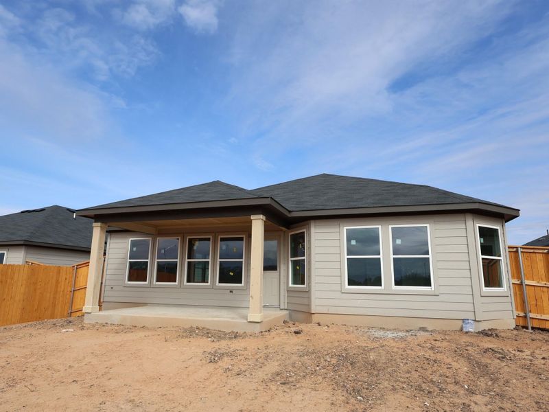 Exterior details and patio area of a home in Carillon, Manor (Image 4).