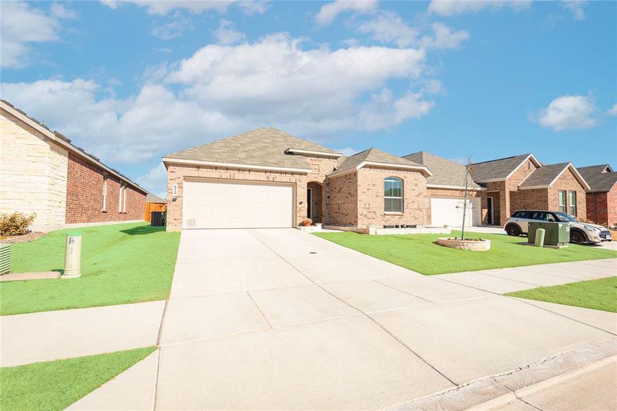 Front exterior of a new home in Bridgewater, Princeton, TX, highlighting curb appeal (Image 23). Front exterior of a new home in Bridgewater, Princeton, TX, highlighting curb appeal (Image 23).