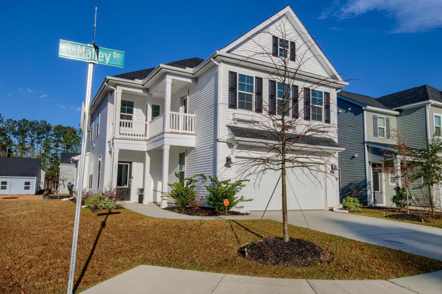 Front exterior of a new home in Six Oaks, Summerville, SC, highlighting curb appeal (Image 30). Front exterior of a new home in Six Oaks, Summerville, SC, highlighting curb appeal (Image 30).