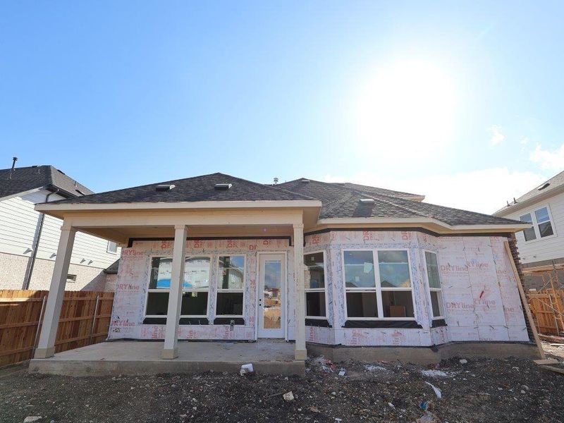 Front exterior of a new home in Barksdale, Leander, TX, highlighting curb appeal (Image 16). Front exterior of a new home in Barksdale, Leander, TX, highlighting curb appeal (Image 16).