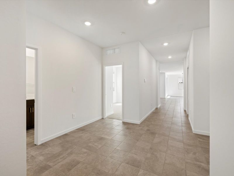 Spacious, unfurnished interior of a new home in Rancho Mirage Estate Series, Maricopa (Image 10).