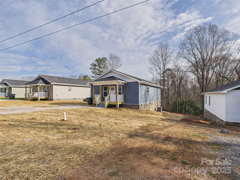 Exterior details and patio area of a home in , Valdese (Image 4).