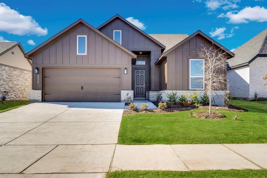 Front exterior of a new home in Hickory Hill, Sherman, TX, highlighting curb appeal (Image 19). Front exterior of a new home in Hickory Hill, Sherman, TX, highlighting curb appeal (Image 19).