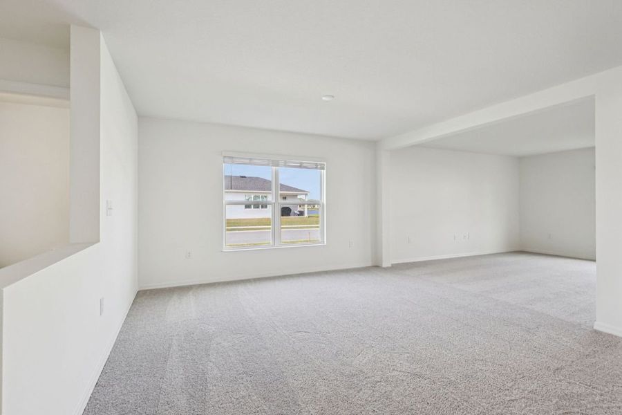 Spacious, unfurnished interior of a new home in Gardens at Waterstone II, Palm Bay (Image 5).