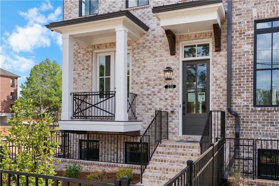 END UNIT with front balcony and fenced front yard
