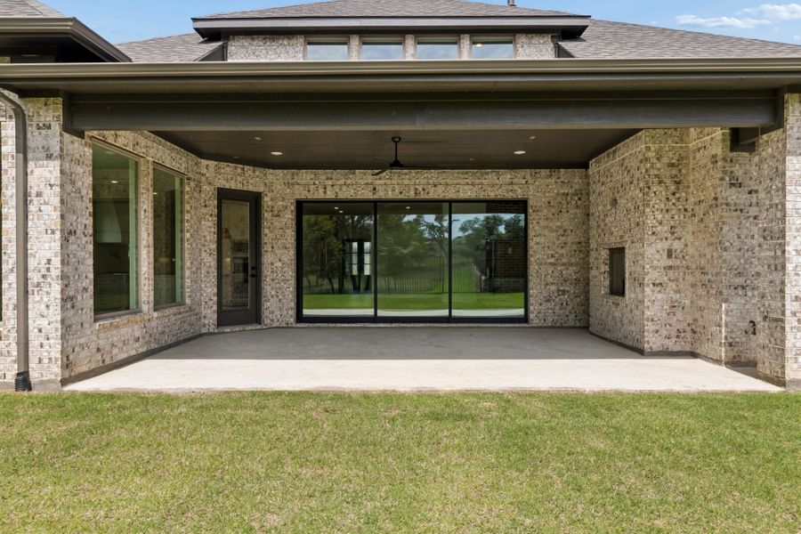 Exterior details and patio area of a home in StarView, Prosper (Image 3). Exterior details and patio area of a home in StarView, Prosper (Image 3).