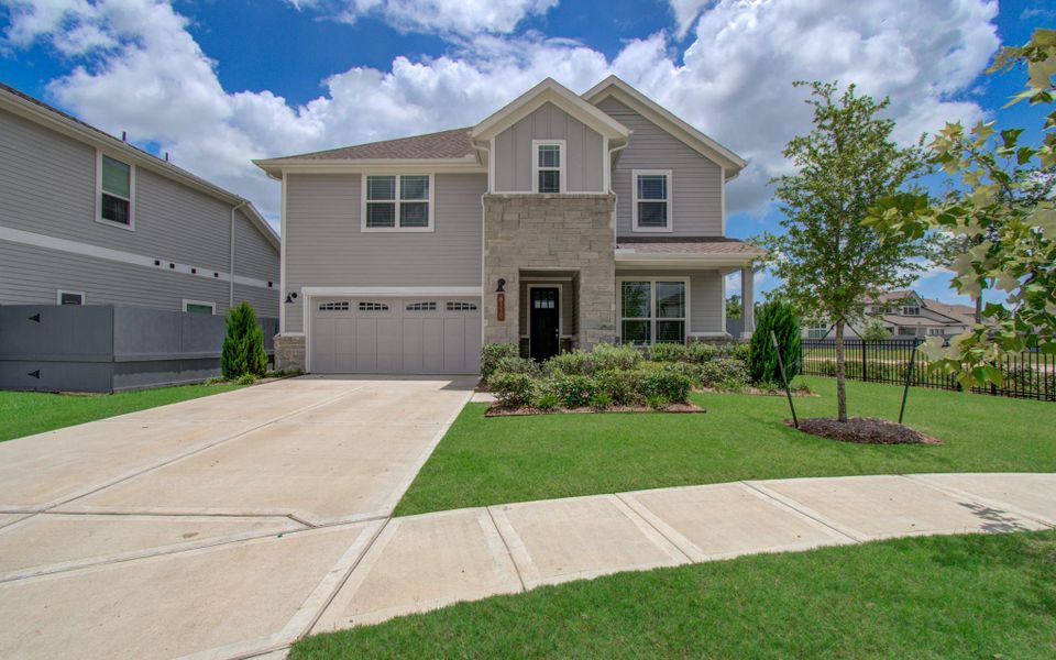 Front exterior of a new home in , Fulshear, TX, highlighting curb appeal (Image 2). Front exterior of a new home in , Fulshear, TX, highlighting curb appeal (Image 2).