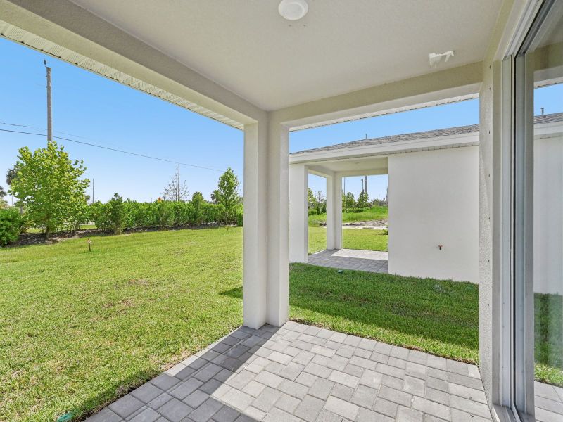 Exterior details and patio area of a home in Hampton Park - Classic Series, Vero Beach (Image 3). Exterior details and patio area of a home in Hampton Park - Classic Series, Vero Beach (Image 3).