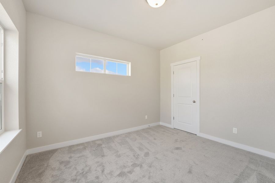 Spacious, unfurnished interior of a new home in The Lakes at Centerra, Loveland (Image 21).