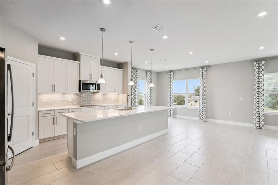 Furnished interior view inside a new home in Bella Terra, Clermont (Image 4). Furnished interior view inside a new home in Bella Terra, Clermont (Image 4).