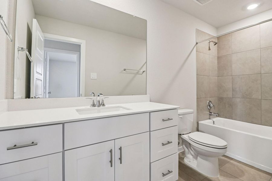 Furnished interior view inside a new home in Pine Lake Cove - Premier Series, Montgomery (Image 6).