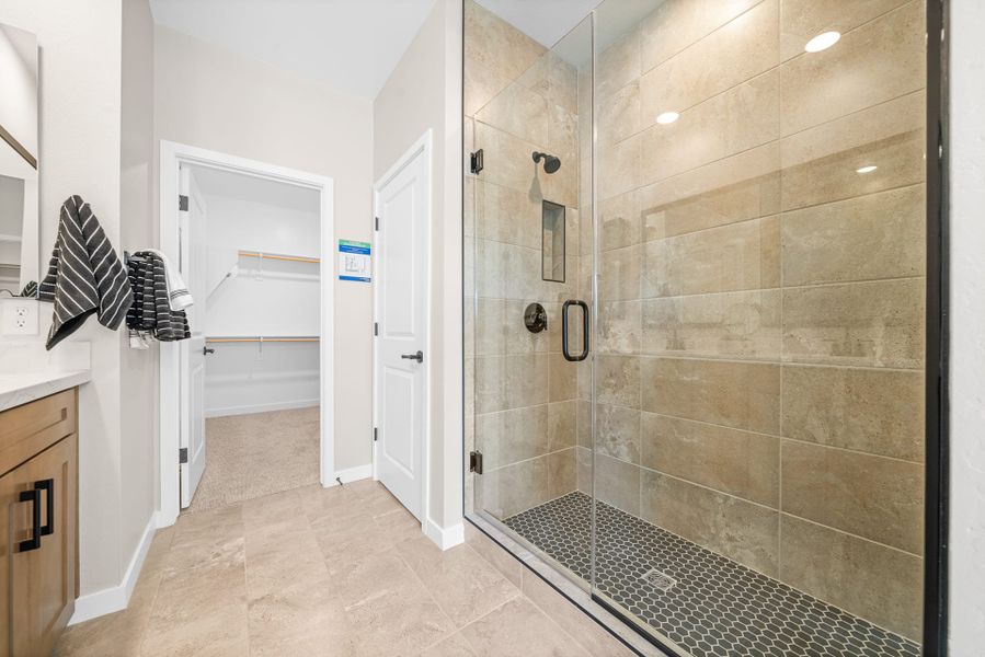 Primary Bathroom Shower | Brisa | Mira Vista at Victory in Buckeye, AZ by Landsea Homes