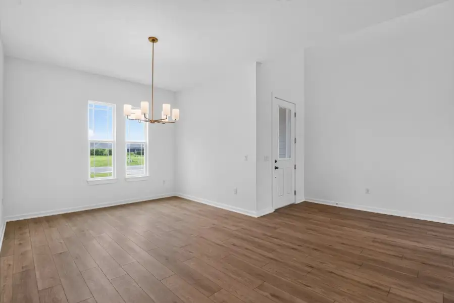 Spacious, unfurnished interior of a new home in Ardisia Park, New Smyrna Beach (Image 15).