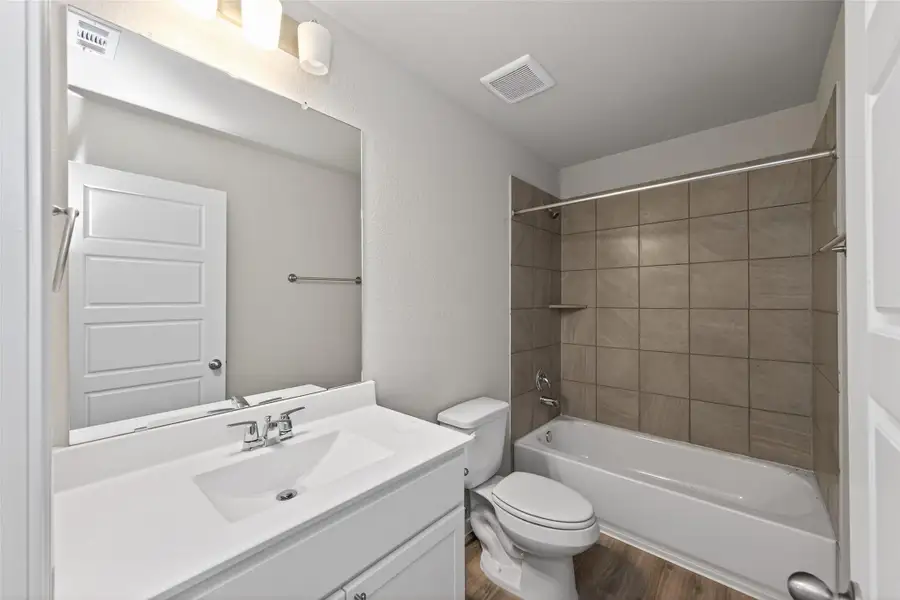 Furnished interior view inside a new home in Woodland Lakes, Houston (Image 14).