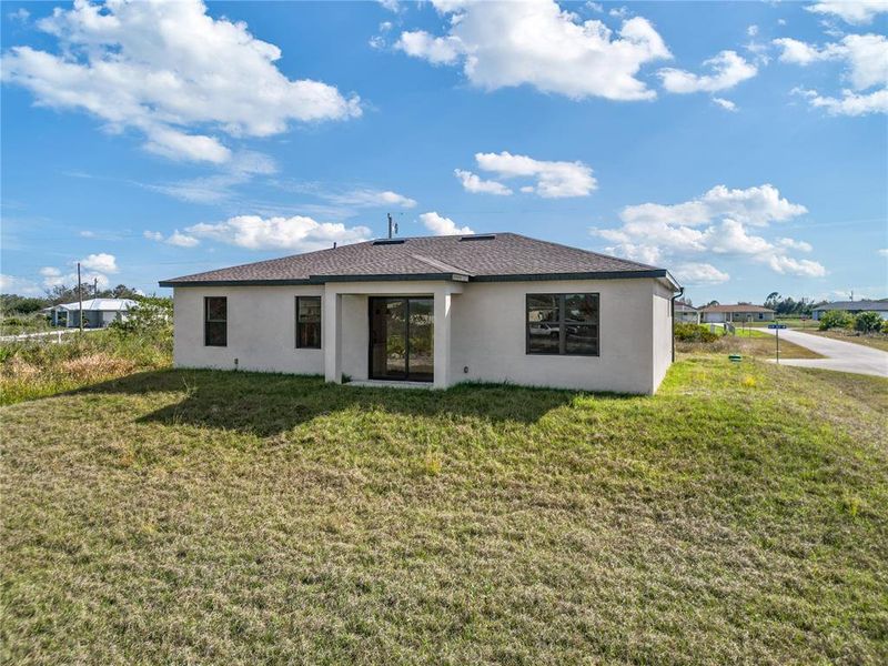 Exterior details and patio area of a home in , Lehigh Acres (Image 3).