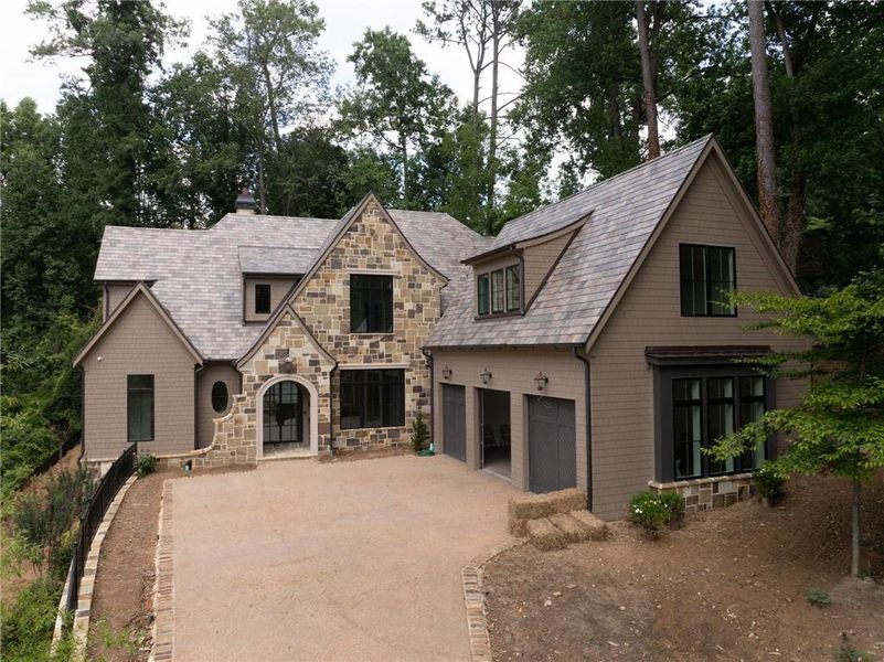 Front exterior of a new home in Blue Heron Walk, Atlanta, GA, highlighting curb appeal (Image 18).