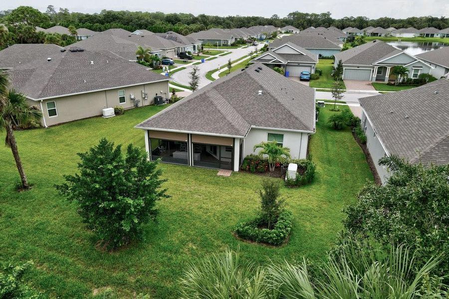 Front exterior of a new home in , Vero Beach, FL, highlighting curb appeal (Image 21).