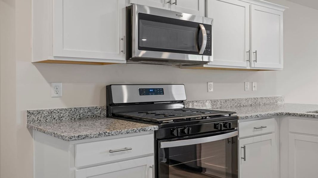 Furnished interior view inside a new home in Lakestone, Woodruff (Image 10).
