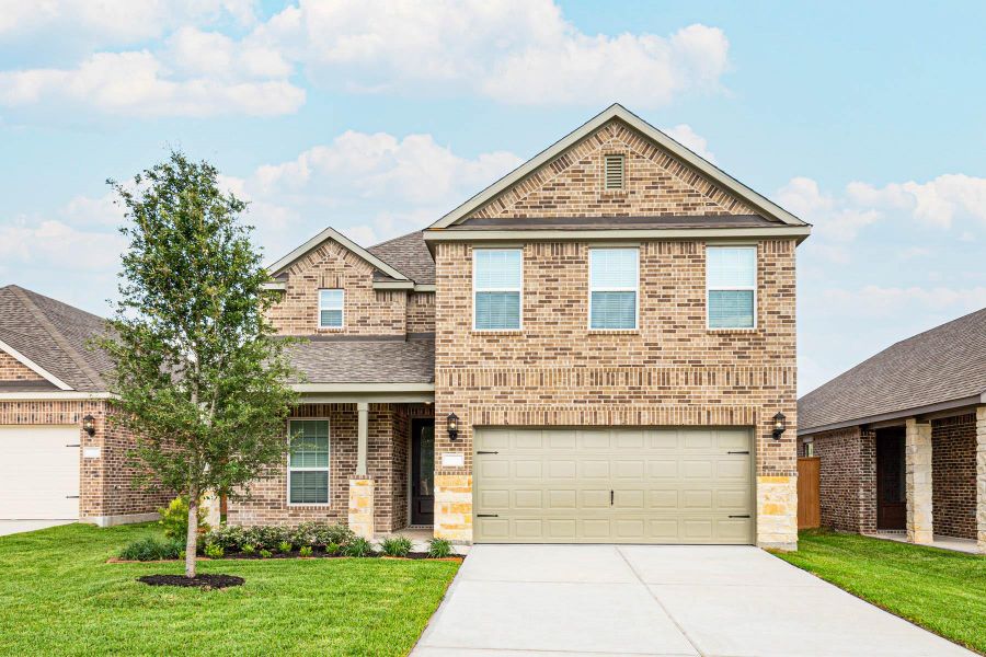 Front exterior of a new home in Wedgewood Forest, Conroe, TX, highlighting curb appeal (Image 1). Front exterior of a new home in Wedgewood Forest, Conroe, TX, highlighting curb appeal (Image 1).
