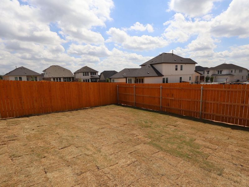 Exterior details and patio area of a home in Heritage, Dripping Springs (Image 3).