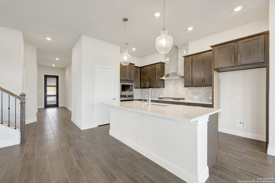 Furnished interior view inside a new home in Windsong - Reserve Series, Boerne (Image 14).