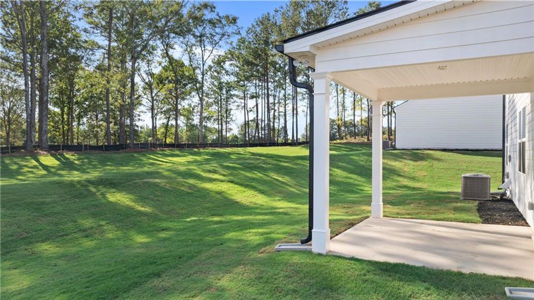 Exterior details and patio area of a home in Kingston Ranch at Lake Oconee, Buckhead (Image 4).