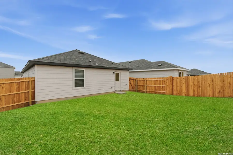 Exterior details and patio area of a home in Vista Real, Converse (Image 3).
