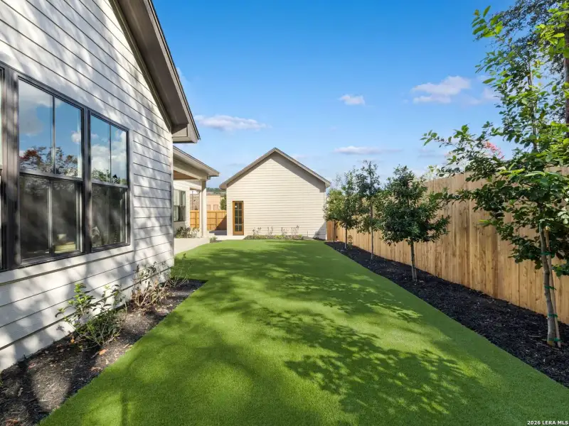 Exterior details and patio area of a home in , Alamo Heights (Image 22).