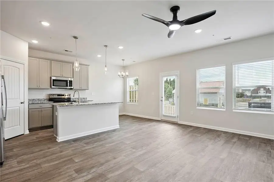 Furnished interior view inside a new home in The Enclave Townhomes, Hampton (Image 3).