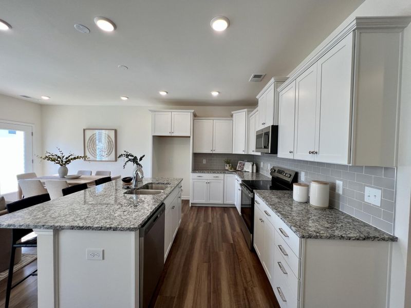 Furnished interior view inside a new home in Bellevue Townhomes, Greenville (Image 7).