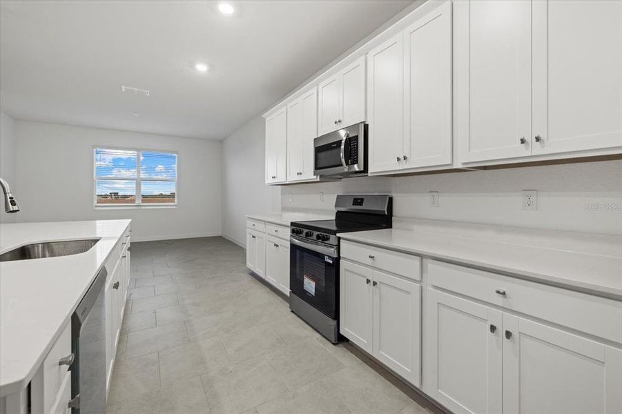 Furnished interior view inside a new home in Rye Ranch, Parrish (Image 35).