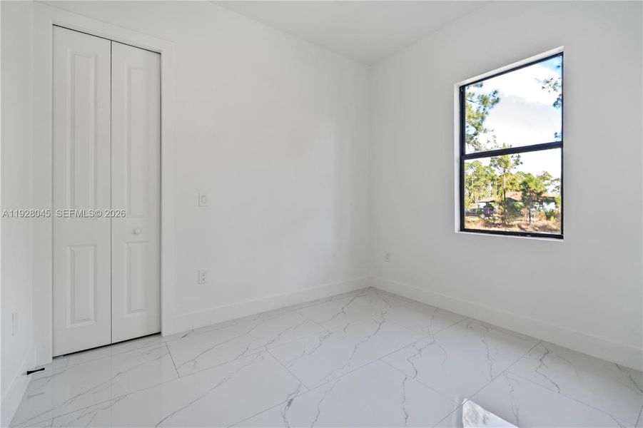Spacious, unfurnished interior of a new home in , Lehigh Acres (Image 51).