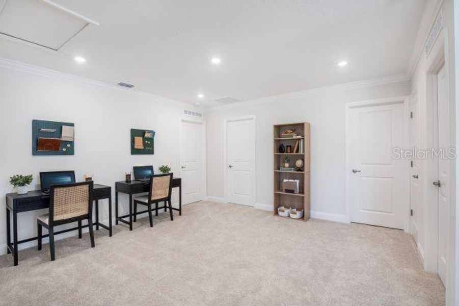 Furnished interior view inside a new home in Lake Deer Estates, Poinciana (Image 15).