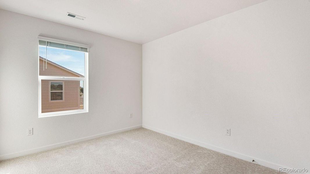 Spacious, unfurnished interior of a new home in Trails at Crowfoot, Parker (Image 38).