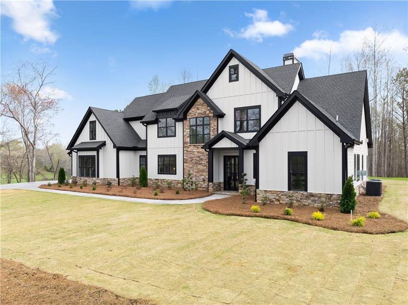 Front exterior of a new home in , Ball Ground, GA, highlighting curb appeal (Image 26).
