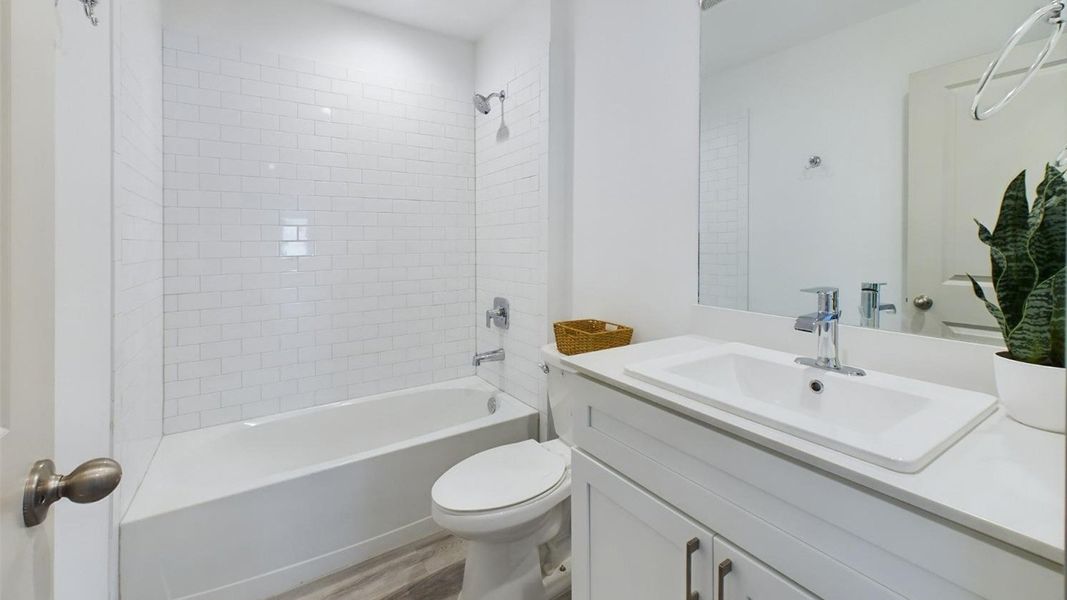 Representative furnished interior of a home built from the The Lakeway by D.R. Horton in Abbey Glen, Lubbock (Image 11).