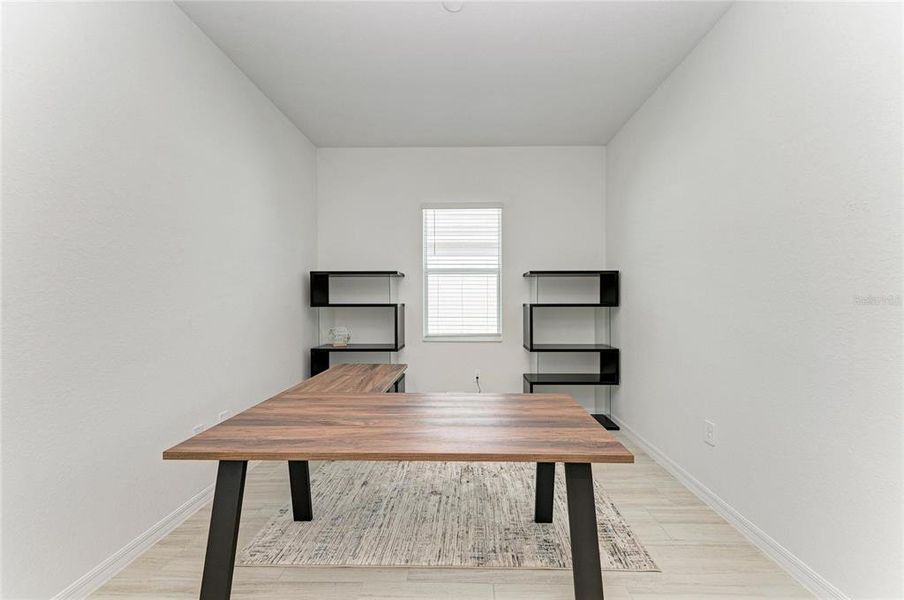 Furnished interior view inside a new home in Calusa Country Club, Lakewood Ranch (Image 37).