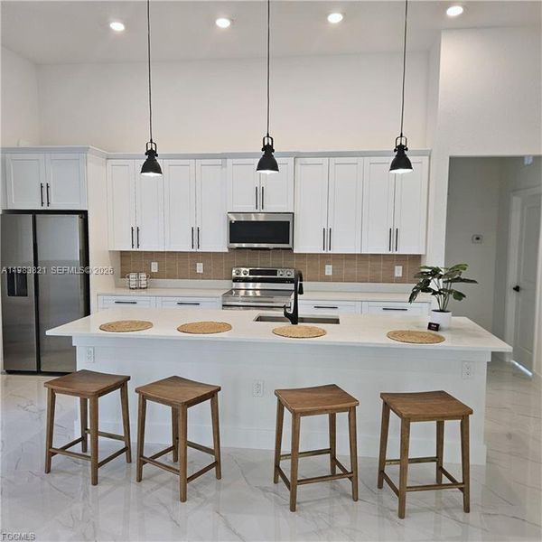 Furnished interior view inside a new home in , Lehigh Acres (Image 6). Furnished interior view inside a new home in , Lehigh Acres (Image 6).