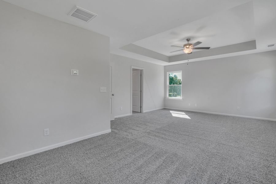 Representative unfurnished interior of a home built from the The Hatteras by Smith Family Homes in Ramsey Landing, Rincon (Image 26).