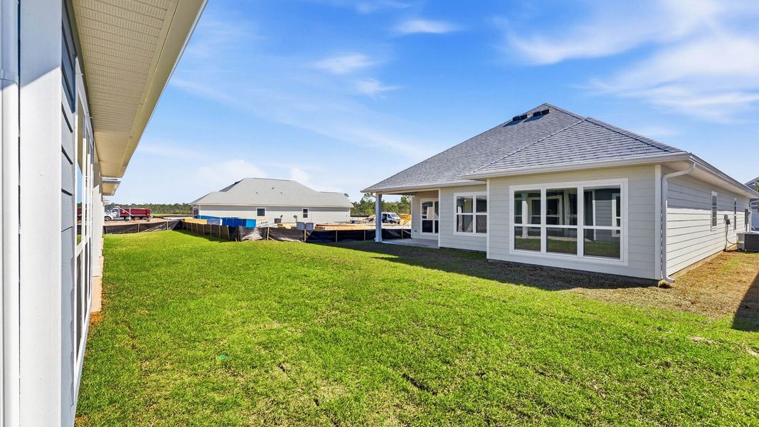 Exterior details and patio area of a home in WindMark Beach, Port Saint Joe (Image 21).