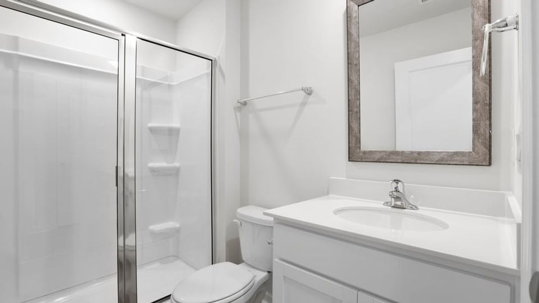 Furnished interior view inside a new home in Lakestone, Woodruff (Image 10).