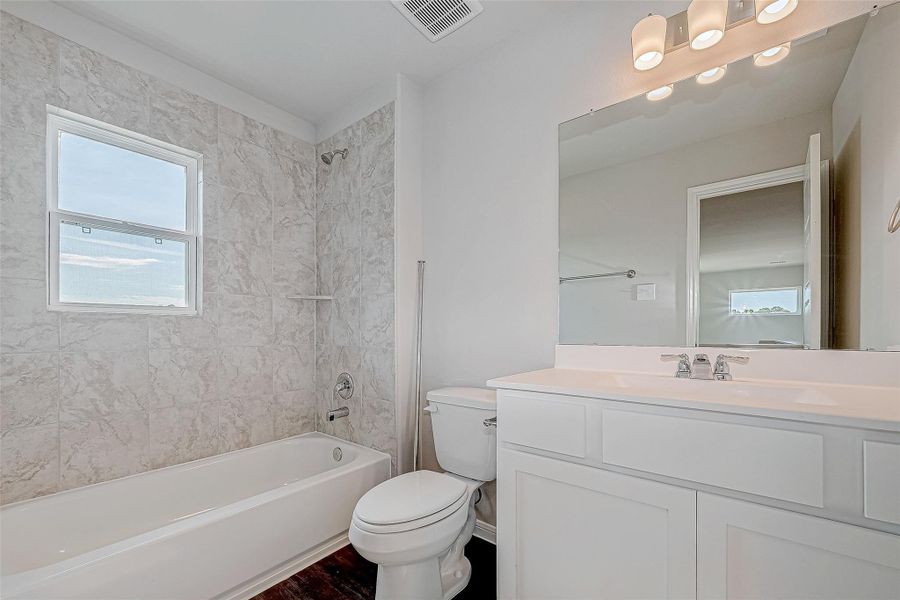 Furnished interior view inside a new home in Mill Creek Trails, Magnolia (Image 7).