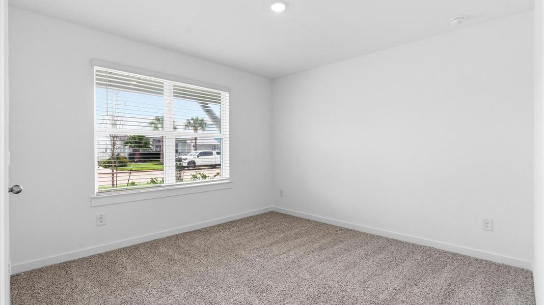 Representative unfurnished interior of a home built from the Justin by D.R. Horton in Grand Cay Harbour, Texas City (Image 12).