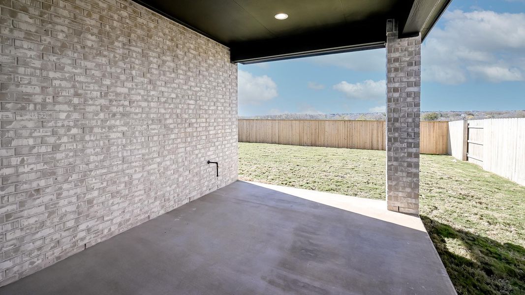 Exterior details and patio area of a home in Crosswinds 50', Kyle (Image 21).