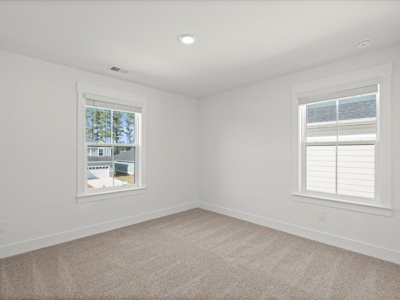 Spacious, unfurnished interior of a new home in The Coves at Lakes of Cane Bay, Summerville (Image 27). Spacious, unfurnished interior of a new home in The Coves at Lakes of Cane Bay, Summerville (Image 27).