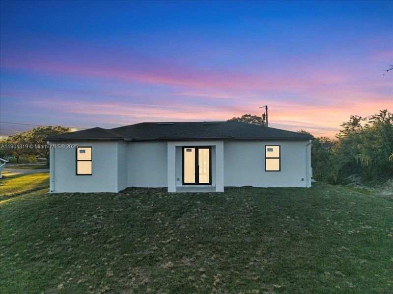 Exterior details and patio area of a home in , Lehigh Acres (Image 4).