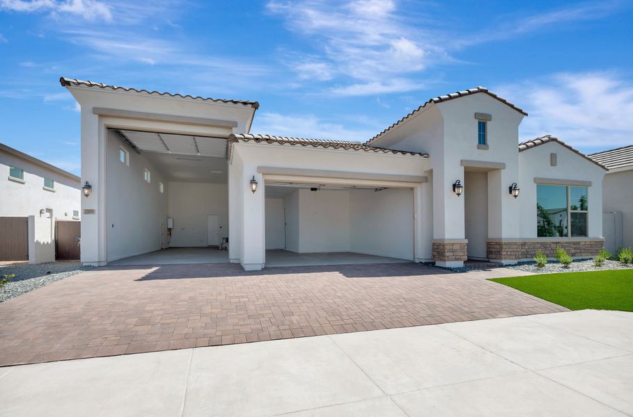 Front exterior of a new home in Tamber at Soleo, San Tan Valley, AZ, highlighting curb appeal (Image 15).