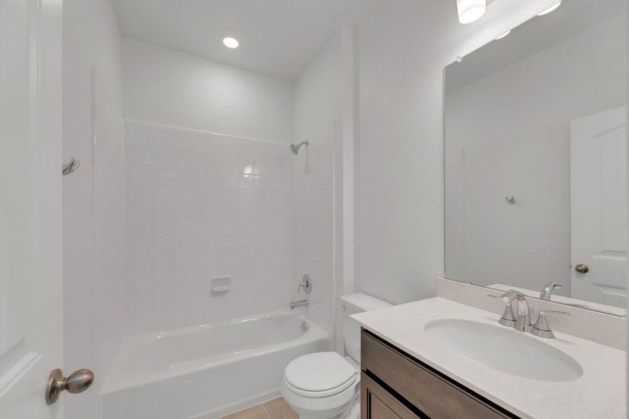 Furnished interior view inside a new home in Mustang Valley, Manor (Image 6). Furnished interior view inside a new home in Mustang Valley, Manor (Image 6).