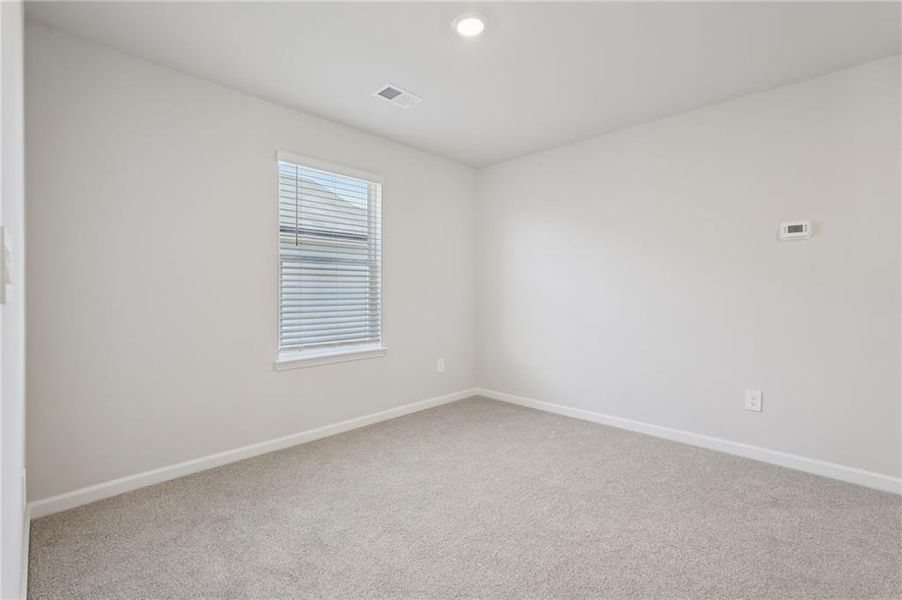 Spacious, unfurnished interior of a new home in Hawthorne Station, College Park (Image 25).