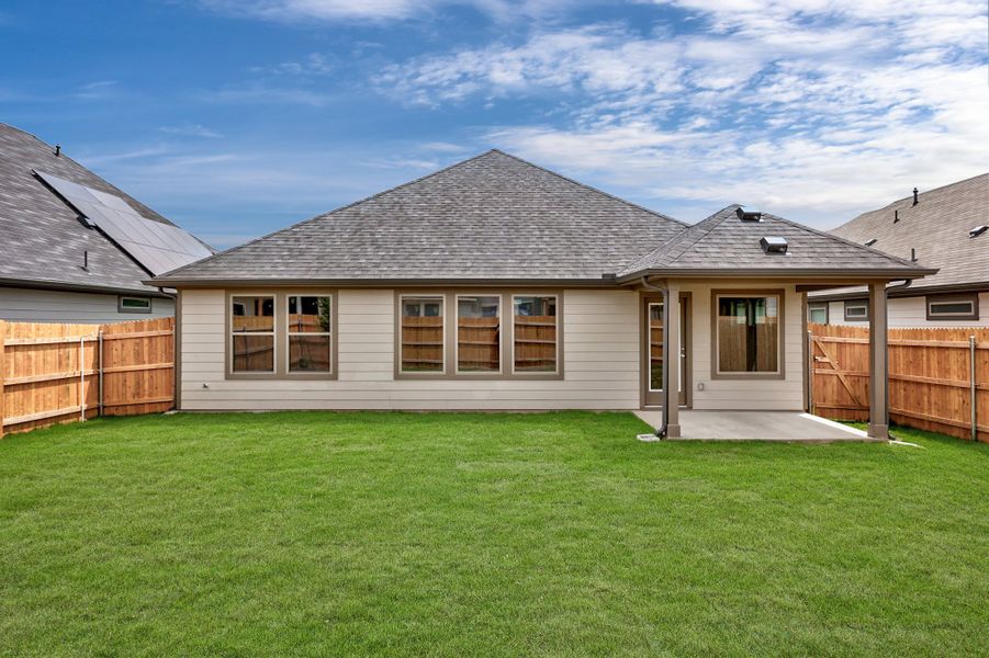 Exterior details and patio area of a home in Prairie Winds, Hutto (Image 4).